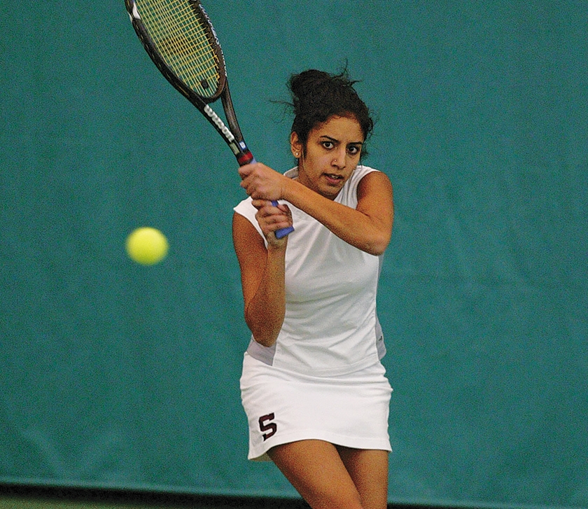 Anjani Reddy returning a tennis shot